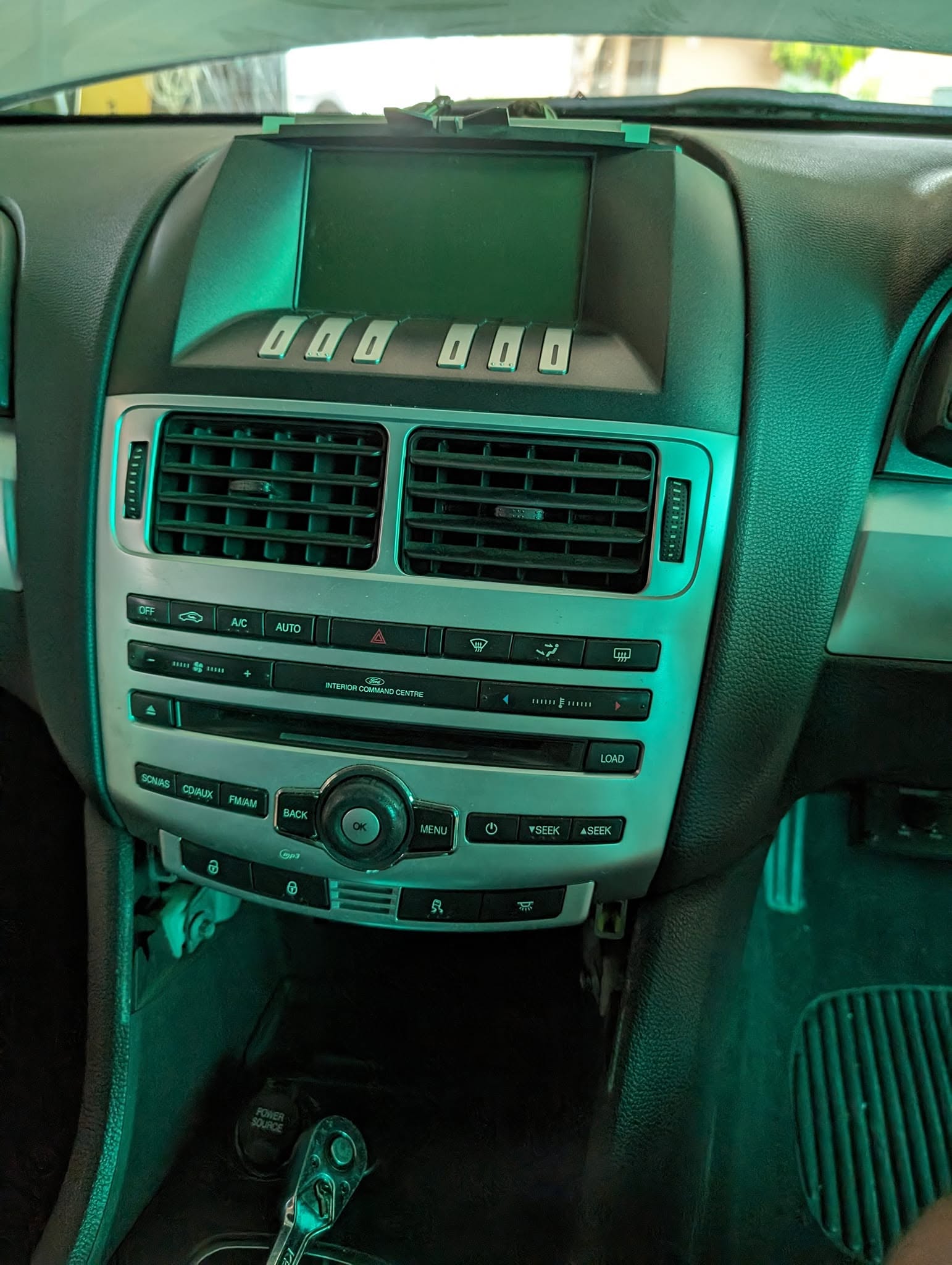 Original factory stereo in a ute dashboard